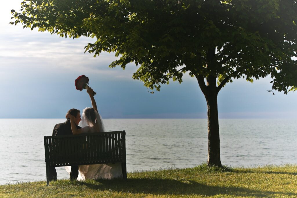 A couple celebrates their wedding day on the edge of Lake Erie, June 2009, by Andrew Morrell Photography