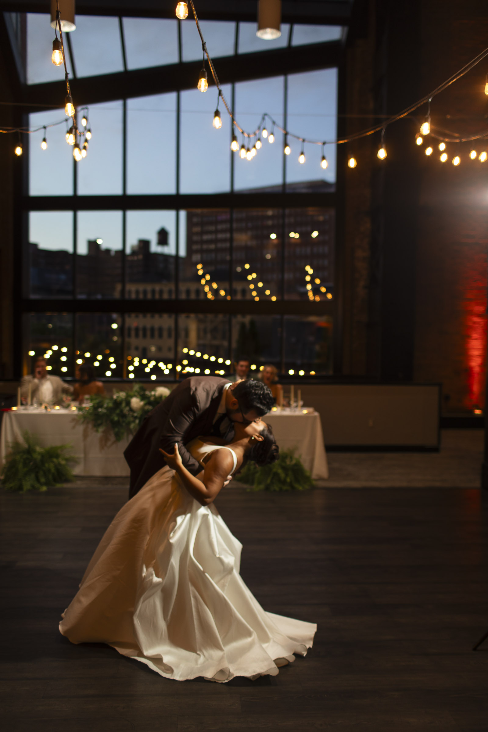 a romantic dip concludes their first dance at the cleveland wedding venue windows on the river